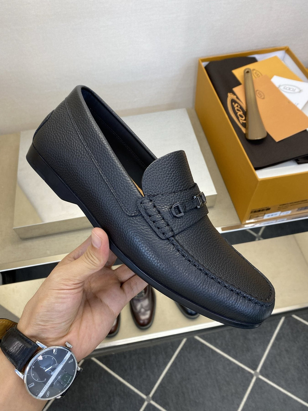 Tod's Black Leather Penny Loafers